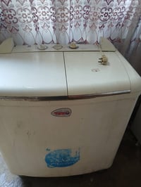 غسالة • غسيل وتجفيف • قفل