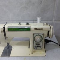 مكينه خياطه ام تطريز سعر 160 وبيها مجال حك جيه 07741342767