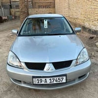 لانسر 2010 رقم كربلاء باسمي سنويه 2030 تبريد خير من الله تخم تاير جديد...
