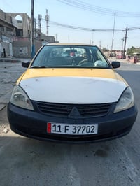 لانسر • ٢٠١٠ • ضربة امامي وخلفي