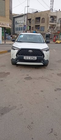 كورلا كروز موديل 24 ماشيه 15 رقم بغداد بسمي تحويل مباشر مكينه 2000 فول...