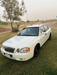 كيا اوبتيما 2006   مكينة 6 اسلندر حجم 2700 جديدة حاويه ستوني  شاده رقم...