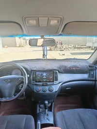 الانترا وارد امريكي 2008 محرك 20 بدون ضرر السقف مرشوش  والبنيد والسندو...