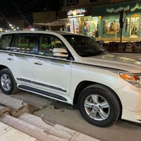 لاندكروز 2014 الموصفات GXR  فتحة  بصمة تشغيل عن بعد  كشنات كهرباء  كشن...