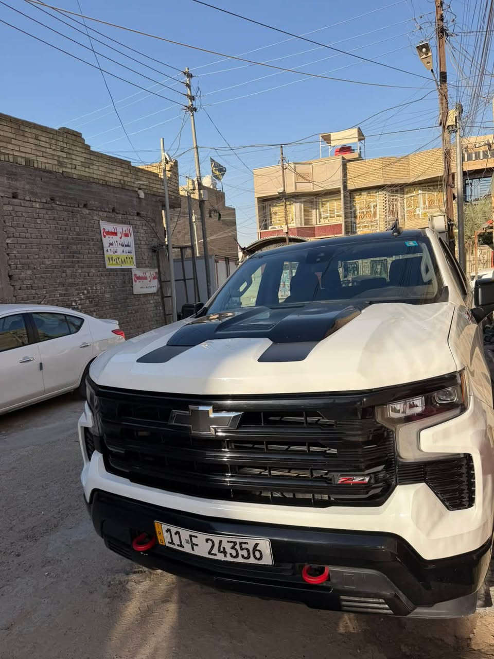 ⸻
السلام عليكم

🚘 شفروليت سلفرادو
Chevrolet Silverado

💰 السعر: 245$

⚪ اللون: أبيض

🚪 الهيكل: باب طويل، بدي قصير

📅 الموديل: 2024

⚙️ المحرك: 5300 V8 (المرغوب)

🔄 القير: 6 سرعات (المرغوب)

🛠 الضرر: قطعتين فقط، واضح بالصور.

📄 الرقم:بغداد. 

✅ المواصفات:

* فور ويل (4WD).
* تشغيل وإطفاء عن بُعد.
* فتح النوافذ عن بُعد.
* إنارة ترحيبية.
* صندوق خلفي كهربائي.
* كاميرا خلفية.
* مانع اصطدام مع فرامل.
* شاشة تدعم Apple CarPlay وAndroid Auto.
* مثبت سرعة.
* تبريد وتدفئة.
* تبريد قطعتين.
* مانع انزلاق.
* سايد بريك كهربائي.
* تنفيذ الأوامر الصوتية.
* تحكمات من المقود (ستيرن).

📌 ملاحظة:
كل شيء واضح بالصور والسنور، والسيارة مباشرة سيرفس، وحجر البيت بسبب البنزين العراق

📍 مكان السيارة: بغداد

📞 رقم الهاتف: ***********

تحياتي للجميع 🌹
