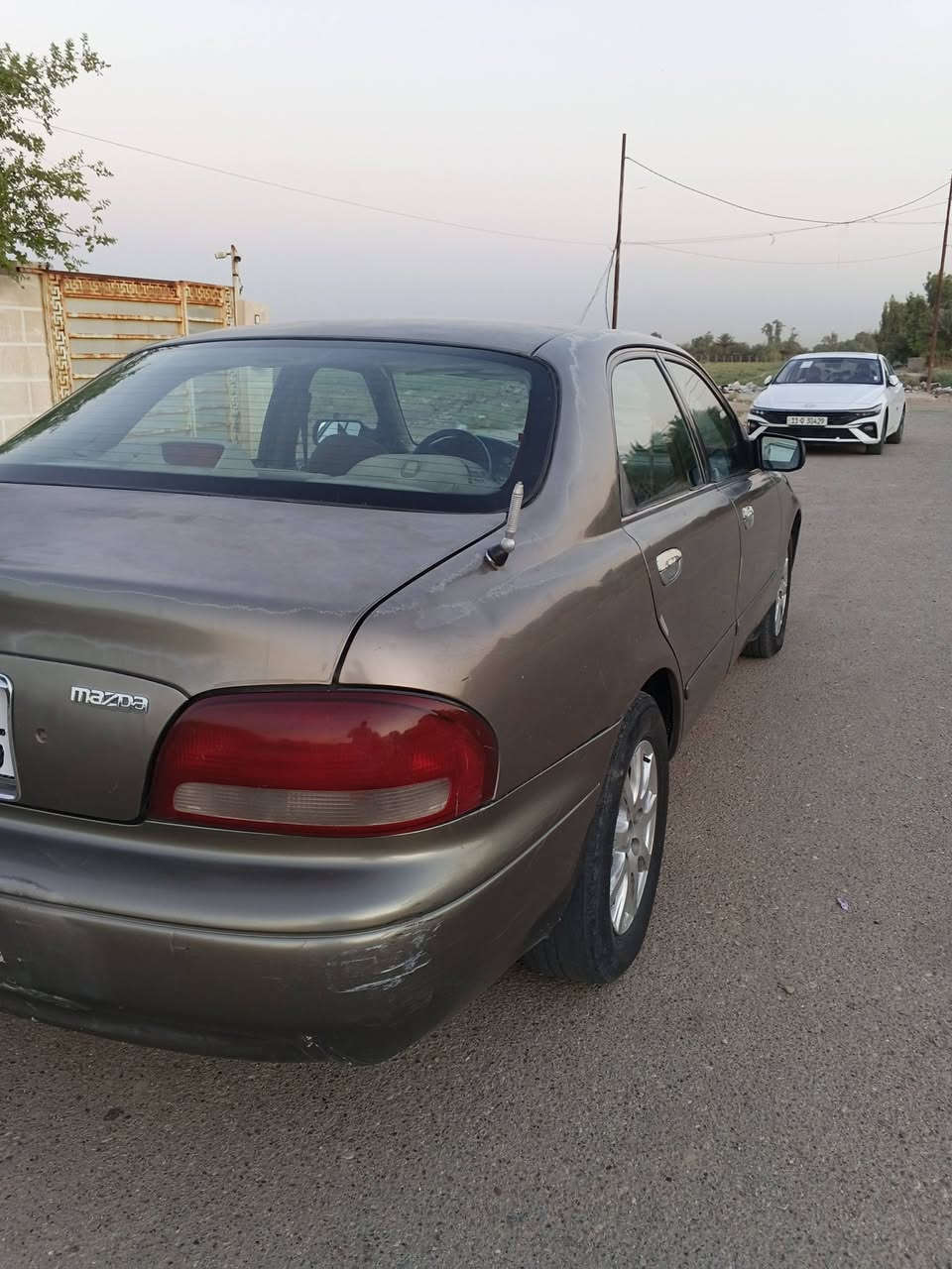 مازدا فاصوليا 1998 
محرك وگير مكفول
4 سلندر سنوية 2029
تدفئة تبريد 
كهربائيات بلاد كلها شغالة
ضرر مكفول بدون اي دواخل 
السعر 41$ وبيها مجال بسيط
العنوان بغداد
***********
