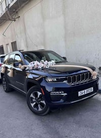 جراند شيروكي 4XE • هايبرد بلك ان • بصرة