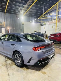 KiA k5 2023 مواصفات LX محرك 1600تيربو كير ATM اربع انظمة قيادة sport/N...