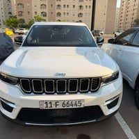 وبركاته جيب كراند شيروكي هايبرد 2024 لون ابيض وارد امريكي مرقم بغداد ب...