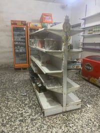 عارضات ورفوف مع ميز جام خانه   مال تعزيله مكاني بغداد مدينه الصدر   07...