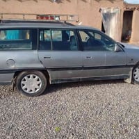 سياره أوميكا ستيشن  صالون أربع تايرات جدد كير ومحرك بالشرط سنويه جديده...