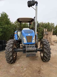 مكينه انيوهلند للبيع 2016حجم 90تي دي سوبر ملقي اكسن بارز تايرات جدد كف...