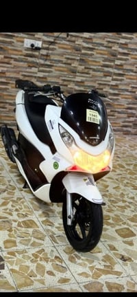 للبيع دراجه pcxجيل اول دراجه رمبه موديل 18 حجم المكينة 150 مال جناي اس...