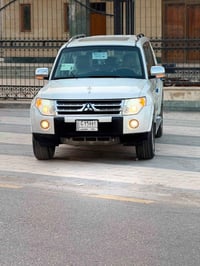 باجيرو 2009  حبتور فول مواصفات لون ابيض صدفي  رقم  بغداد مشروع واطني ب...