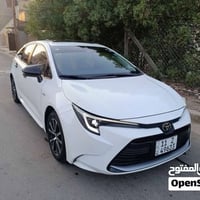 كورلا هايبرد الشكل الامريكي موديل 24 ماشية 30 الف كم سيارة تجي فول موا...