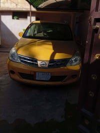 للبيع نيسان تيدا 2008  بأسمي تاخذهة شرط التحويل السيارة خير من الله مك...