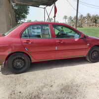 لانسر للبيع سياره جاهزه مكفوله من الصبغ والضربه حداديه تبريد شغال مكين...