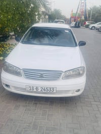 بسم الله  نيسان سني ٢٠٠٤ سيارة مصبوغة عام بدون حادث أو دواخل  مكينه وك...