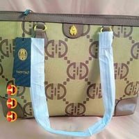 حقيبة يد • زيتي • كربلاء