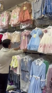 محلات النورس • أزياء أطفال • شارع بنت الحسن