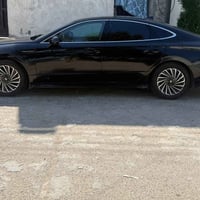 سوناتا امريكي هايبرد لمتد موديل 2024  الون اسود ماشيه 10الف ميل  السيا...