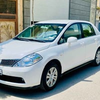 نیسان تیدا 2007 رەنگی سپی  سەنەوی تا 2029 تازەیە  هیچ هیچ مەسرەفێکی تێ...