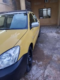 لانسر 2009 كير محرك خير من الله محرك 2000كير عادي صدر امامي خلفي جديد ...