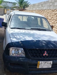 سيارة بيك اب • ميتسوبيشي بيك اب • ميتسوبيشي 2004 • سيارة نظيفة • محرك ...