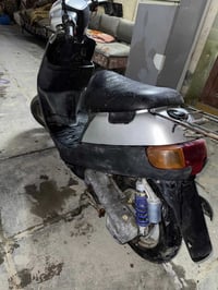 دراجتين بطه • موديل 2003 • رصاصية وحمراء