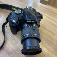 نيكون D330 • كاميرا • النجف