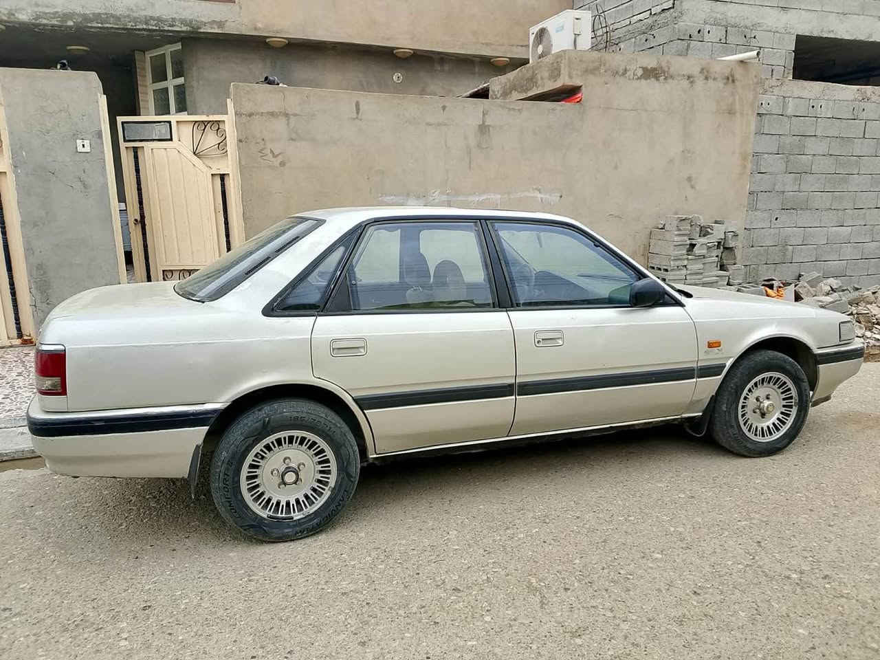 مازدةموديل1990گبرومكينة بةشرت تةقةوراقةربةشرت سنةوي بةسةرجووة سعر41شوين كفري *********** كيفري, ديالى
