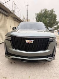 كاديلاك اسكليدموديل 2023  وارد أمريكي  كلين تايتل. السيارة ماشية 29ميل...