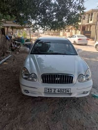 سونتا وفود اللون ابيض محرك وكير مكفولات جاهزه من كلشي تخم تأير كهربائي...