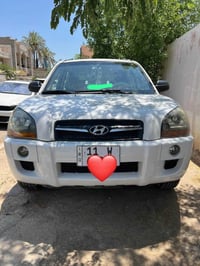 توسان موديل 2010 خليجي محرك ٢٠٠٠ دوش ماشيه ١٩٠ الف ضربتها الجاملغ الأي...