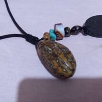 حجر عباس أباد • منقوش الله القهار • مرصع فيروز وعقيق