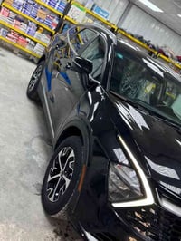 للبيع كيا سبورتج 2023 هايبرد استخدام امرأة  رقم بغداد الجديد  محرك 160...