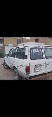 لاندكروز ١٩٨٩ • أبيض • رقم بغداد