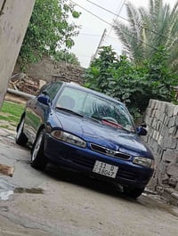 بروتون ويره موديل 2004 سياره بسمي رقم بغداد نكليزي نظيفه جاهزه مابيهه ...
