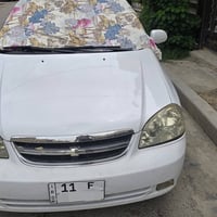 اوبترا للبيع موديل 2013 ابيض مكفوله من الضربه بيها طخه بالجاملغ الخلفي...