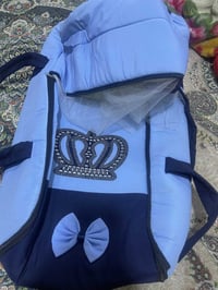 مسند اب • حمالة طفل • مستخدمة مرة وحدة