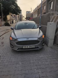 فورد فيوجن موديل 20 بيها جمالغ الأمامي الايسر شويه من البني وكم قطعه ص...