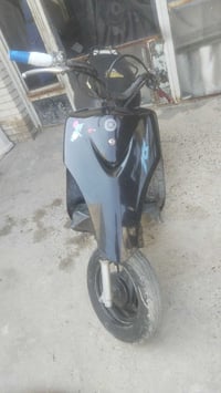 عندي دراجه للبيع بوشه 55 مكان بغداد رقمي 07721655337 بس باتري نقص