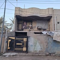 بيت طابقين • مساحة ١٤٠م • خلف مول جنائن كربلاء