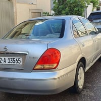 نيسان صني موديل 2009 سنوي حه تا 2029 كير و مكينه به شرت  كير عادي  تبر...