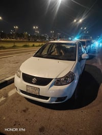 سوسوكي xs4 2009سنويه 2029 سياره جاهز كير محرك ارضيه جلد طخم تاير باتري...