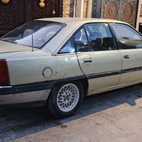 اوميغا • ١٩٩٠ • نجف بسمي