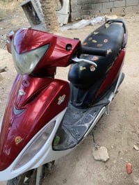 كامكو جي فور • موتوسيكل