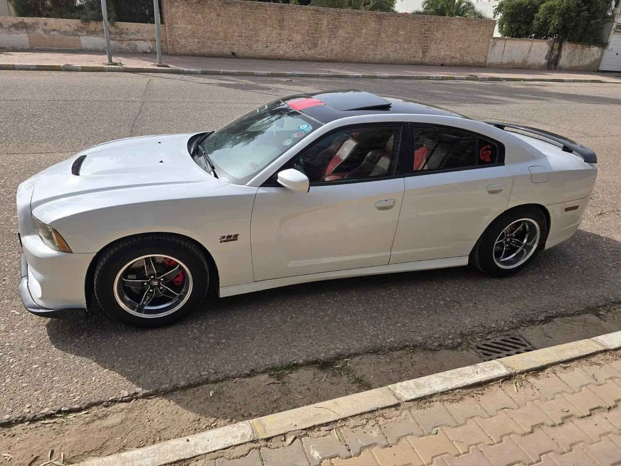 (( فقط بيع )) جارجر HEMI فول مواصفات موديل 2013 سنويه باسمي السياره بدون ارباك وبدون شواصي صور السونار ضمن الصور        ***********9
1 مكينه ٥٧٠٠
2 رادر امامي
3 ستيرن كهربائي
4 نقطه عمياء
5 شفتات ستيرن
6 شاشه كبيره
7 كشنات تبريد تدفئه
8 نظام تحديد المسار 
9 فتحه سقف
10 كلاصات تدفئه تبريد
11 سكليتر البانزين والبريك كهربائي
12 كرسي السائق Flash Memory
13 نظام تسارع Sport
14 نظام صرف الوقود Eco
