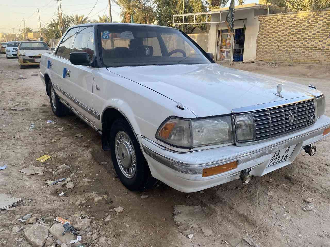 سوبر هارتوب علابلاد موديل 1990 يسره بلادي رقم بغداد دولي هزه جديده سنوية لغاية 2027محرك VVT-i جديد كير جديد تبريد شغال ثلج تخم تاير سياره متعوب عليهه بيهه تراي للبصرة تحويل ثاني يوم كهربائيات كله شغال
سعر 44 ورقه وبيه مجال رقم *********** 
مكان السيارة الديوانية المركز
