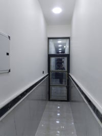 مشتمل ١٠٠متر قرب الفلكه القاضي حي الغدير طابو غير مسكون 07753059505